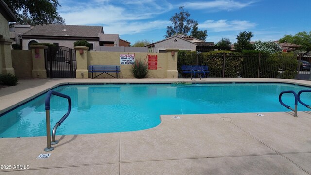 7029 S Golfside Ln, Phoenix, AZ 85042 - community pool featuring a gate