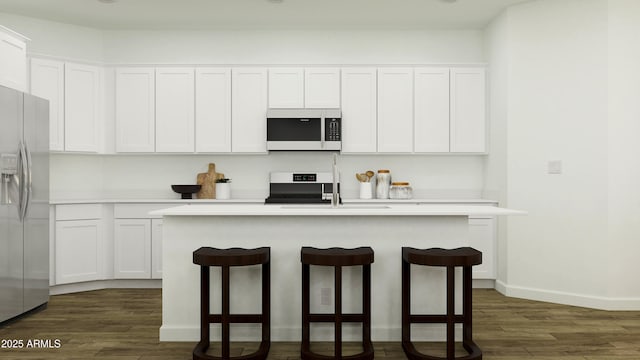 kitchen with dark wood-style floors, white cabinets, stainless steel fridge with ice dispenser, and stove