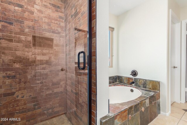 empty room featuring ceiling fan and light hardwood / wood-style floors