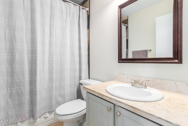 clothes washing area with light tile patterned floors, gas dryer hookup, electric dryer hookup, washer hookup, and cabinets