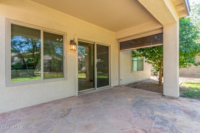 back of property featuring a patio area, a lawn, and central air condition unit