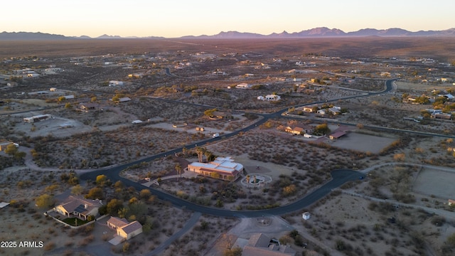 aerial view at dusk with a mountain view