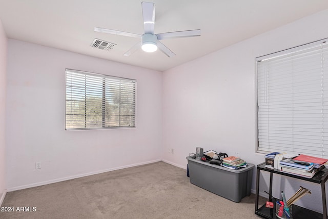 miscellaneous room featuring a ceiling fan, baseboards, visible vents, and carpet flooring