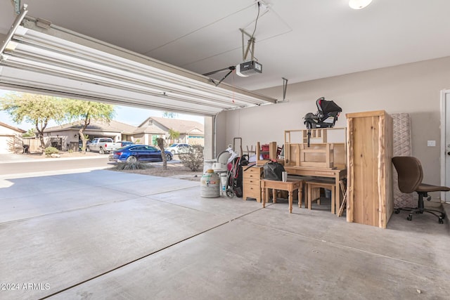 garage featuring a garage door opener