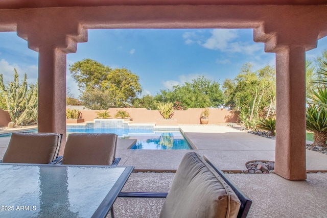 view of pool featuring a patio