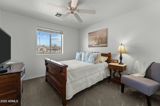 carpeted bedroom with visible vents, ceiling fan, and baseboards