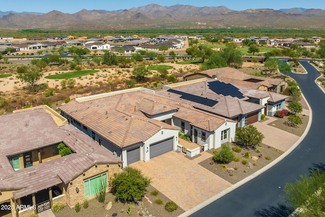 aerial view featuring a mountain view and a residential view