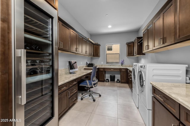 clothes washing area featuring wine cooler, washer and clothes dryer, recessed lighting, and light tile patterned floors