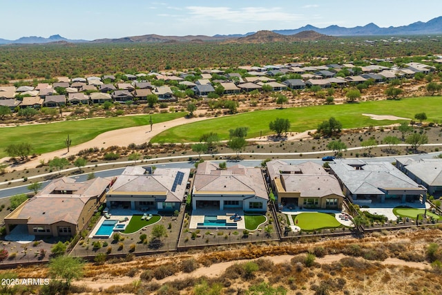 birds eye view of property featuring a mountain view, golf course view, and a residential view