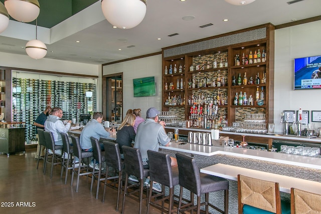 bar with recessed lighting, indoor wet bar, and visible vents