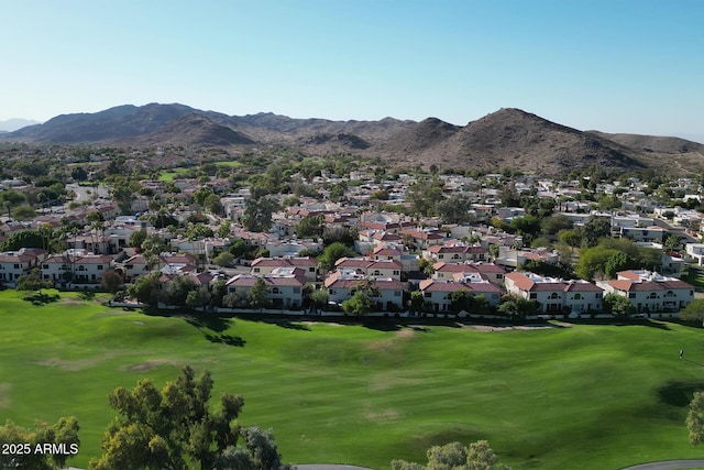 exterior space with a residential view and a mountain view