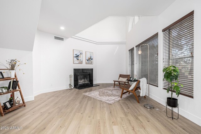 sitting room featuring light hardwood / wood-style flooring