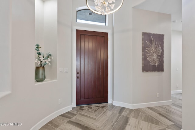 3045 W Feather Sound Dr, Phoenix, AZ 85086 - foyer entrance featuring a chandelier and baseboards