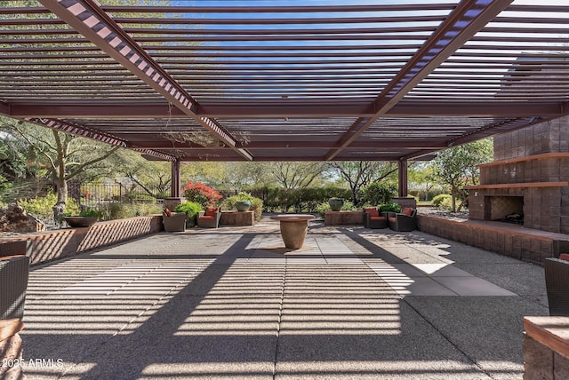3045 W Feather Sound Dr, Phoenix, AZ 85086 - view of patio / terrace with exterior fireplace and a pergola