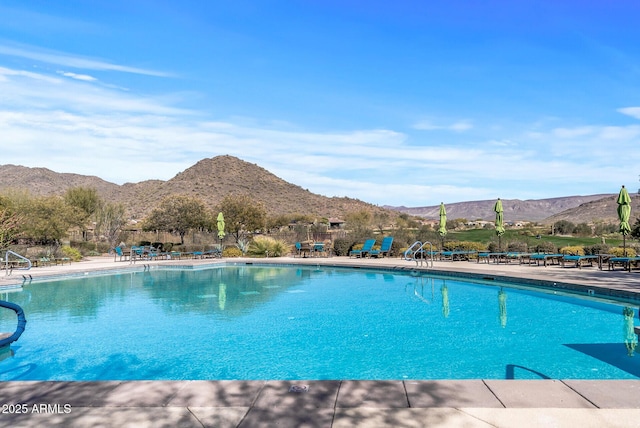 3045 W Feather Sound Dr, Phoenix, AZ 85086 - community pool with a mountain view and a patio