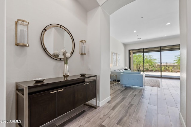 3045 W Feather Sound Dr, Phoenix, AZ 85086 - hallway featuring light wood-style floors, recessed lighting, and baseboards