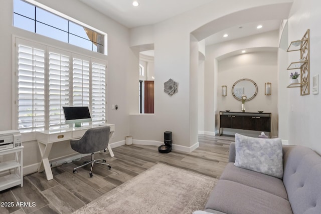 3045 W Feather Sound Dr, Phoenix, AZ 85086 - office space featuring wood finished floors, arched walkways, recessed lighting, and baseboards