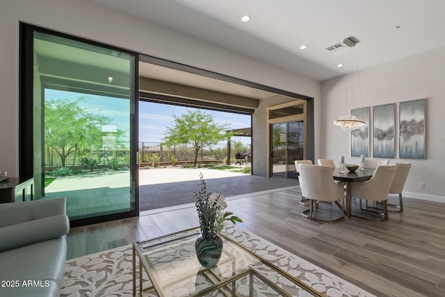 3045 W Feather Sound Dr, Phoenix, AZ 85086 - living area with wood finished floors, recessed lighting, and baseboards