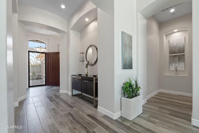 3045 W Feather Sound Dr, Phoenix, AZ 85086 - entrance foyer with wood finished floors, a chandelier, baseboards, and recessed lighting