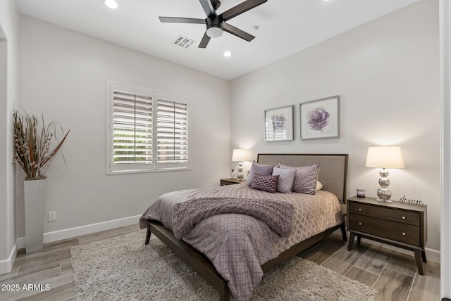 3045 W Feather Sound Dr, Phoenix, AZ 85086 - bedroom with recessed lighting, light wood-type flooring, baseboards, and ceiling fan