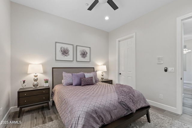3045 W Feather Sound Dr, Phoenix, AZ 85086 - bedroom with wood finished floors, baseboards, recessed lighting, and a ceiling fan