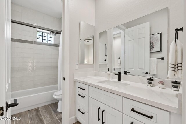 3045 W Feather Sound Dr, Phoenix, AZ 85086 - bathroom featuring vanity, toilet, shower / tub combo, and wood finished floors