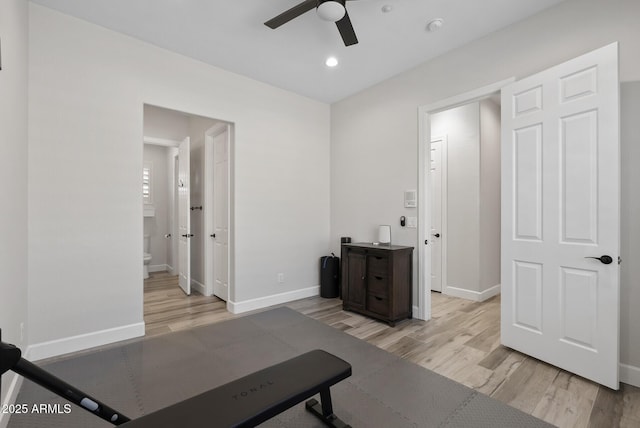 3045 W Feather Sound Dr, Phoenix, AZ 85086 - exercise room with ceiling fan, light wood-style floors, baseboards, and recessed lighting