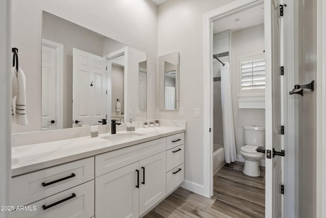 3045 W Feather Sound Dr, Phoenix, AZ 85086 - full bathroom featuring vanity, shower / bath combination with curtain, toilet, and wood finished floors