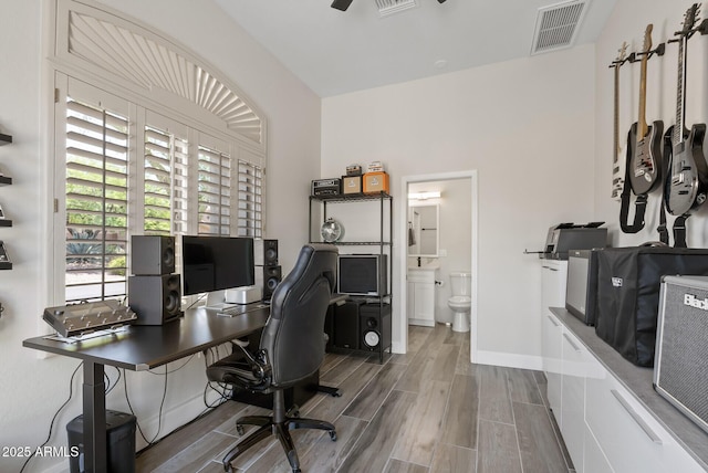 3045 W Feather Sound Dr, Phoenix, AZ 85086 - office featuring wood finished floors, baseboards, and ceiling fan