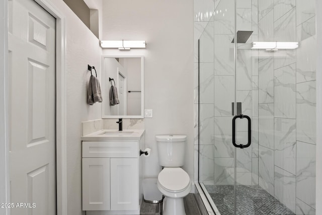 3045 W Feather Sound Dr, Phoenix, AZ 85086 - full bathroom featuring toilet, a stall shower, and vanity