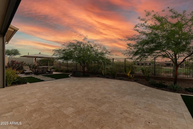 3045 W Feather Sound Dr, Phoenix, AZ 85086 - patio terrace at dusk with a patio and a fenced backyard