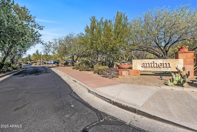 3045 W Feather Sound Dr, Phoenix, AZ 85086 - view of asphalt road featuring curbs and sidewalks