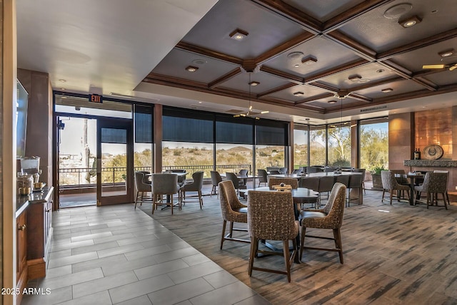 3045 W Feather Sound Dr, Phoenix, AZ 85086 - dining space with floor to ceiling windows, coffered ceiling, and beam ceiling