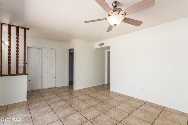 17244 N 36th Ln, Glendale, AZ 85308 - empty room featuring a ceiling fan and light tile patterned floors