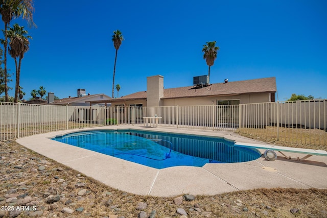 17244 N 36th Ln, Glendale, AZ 85308 - view of pool featuring fence, cooling unit, a patio area, and a diving board