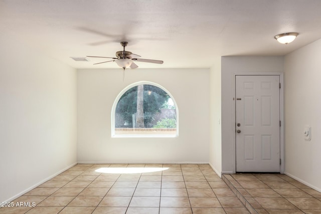17244 N 36th Ln, Glendale, AZ 85308 - foyer featuring a ceiling fan, light tile patterned floors, and baseboards