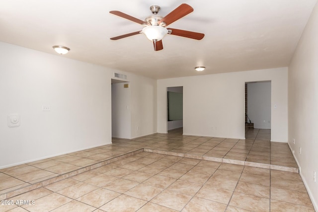 17244 N 36th Ln, Glendale, AZ 85308 - unfurnished room featuring a ceiling fan and light tile patterned floors