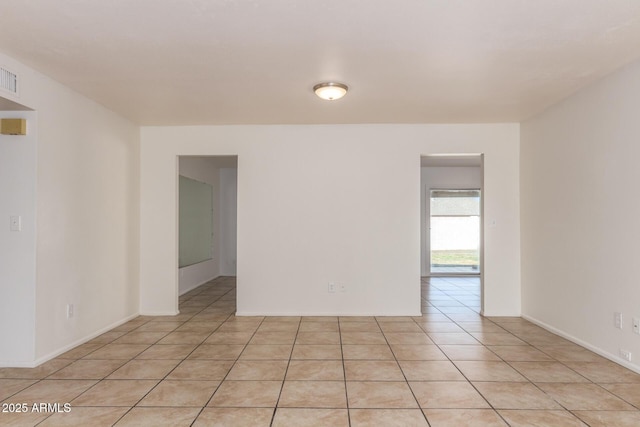 17244 N 36th Ln, Glendale, AZ 85308 - empty room featuring light tile patterned floors