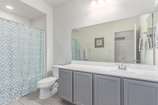 16221 W Prickly Pear Trl, Surprise, AZ 85387 - bathroom featuring toilet, vanity, a shower with shower curtain, and recessed lighting