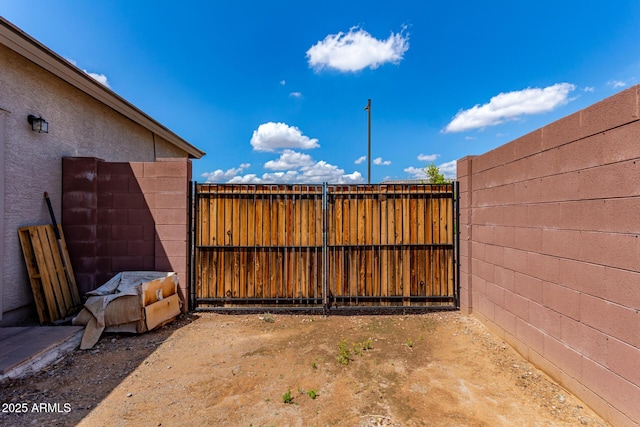 16221 W Prickly Pear Trl, Surprise, AZ 85387 - view of patio with a gate