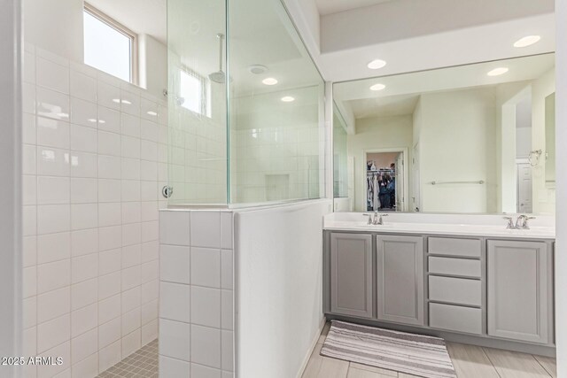 16221 W Prickly Pear Trl, Surprise, AZ 85387 - full bath featuring walk in shower, double vanity, a walk in closet, and recessed lighting