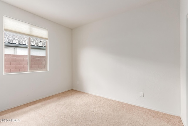 16221 W Prickly Pear Trl, Surprise, AZ 85387 - carpeted spare room featuring baseboards