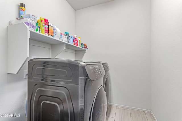 16221 W Prickly Pear Trl, Surprise, AZ 85387 - laundry room featuring washer and clothes dryer and baseboards