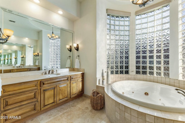 11320 N Crestview Dr, Fountain Hills, AZ 85268 - full bathroom with visible vents, a chandelier, tile patterned floors, vanity, and a jetted tub
