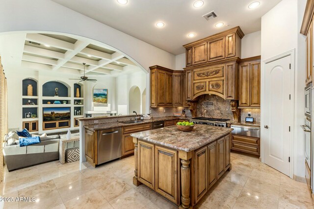 11320 N Crestview Dr, Fountain Hills, AZ 85268 - kitchen featuring a warming drawer, stainless steel appliances, arched walkways, visible vents, and a ceiling fan