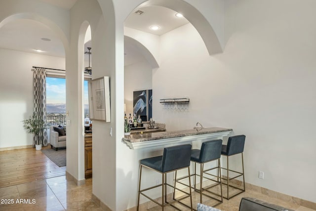 11320 N Crestview Dr, Fountain Hills, AZ 85268 - bar featuring baseboards, recessed lighting, visible vents, and wet bar