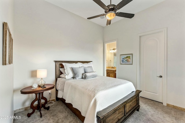 11320 N Crestview Dr, Fountain Hills, AZ 85268 - bedroom with baseboards, connected bathroom, a ceiling fan, and light carpet