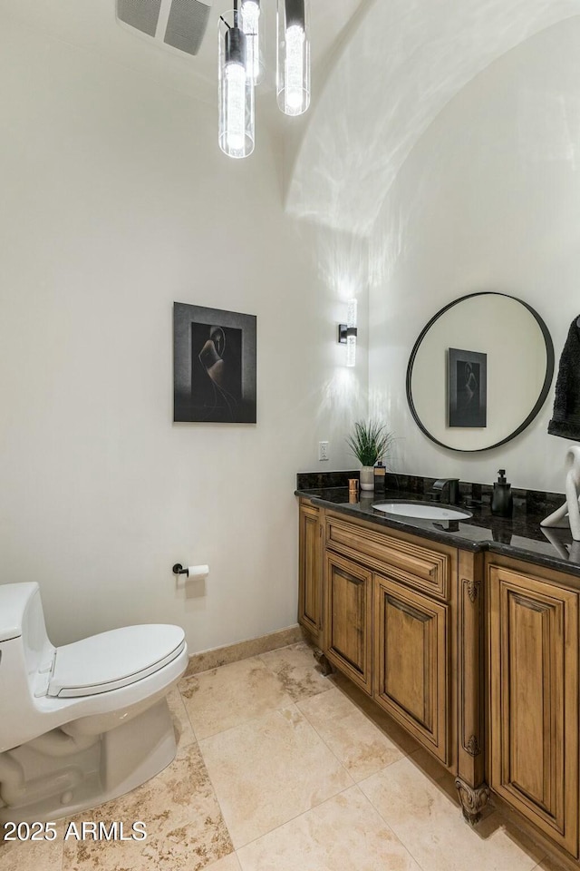 11320 N Crestview Dr, Fountain Hills, AZ 85268 - half bath with baseboards, toilet, tile patterned flooring, and vanity