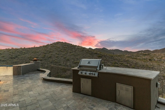 11320 N Crestview Dr, Fountain Hills, AZ 85268 - view of patio / terrace with a mountain view, an outdoor kitchen, and area for grilling