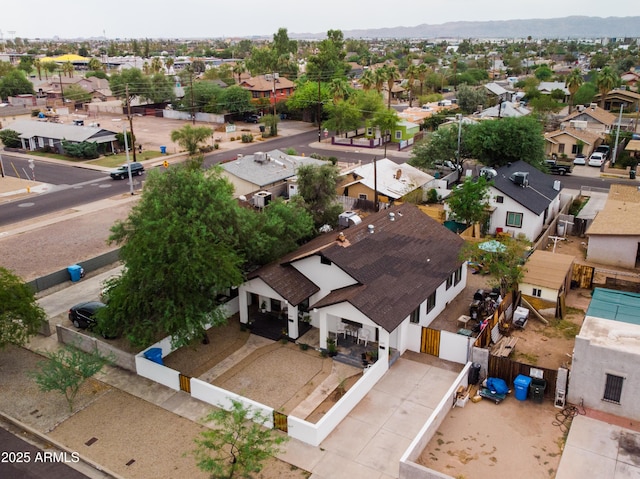 birds eye view of property with a residential view